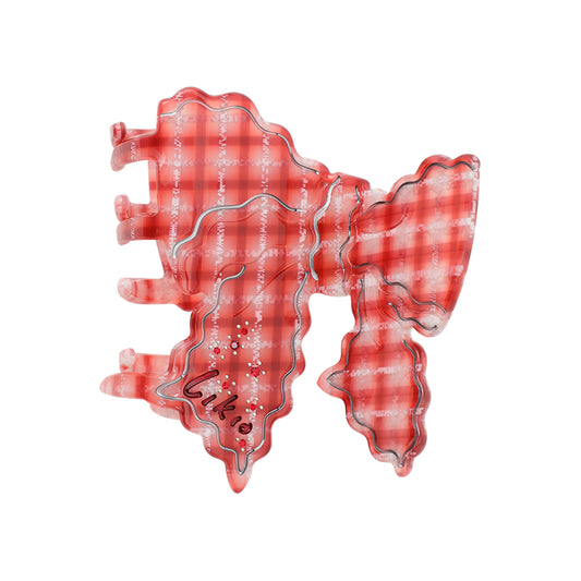 Wavy Carved Bow Hair Claw