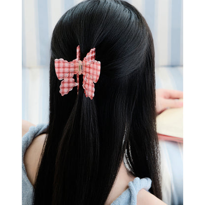 Wavy Carved Bow Hair Claw