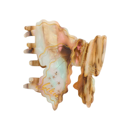 Wavy Carved Bow Hair Claw