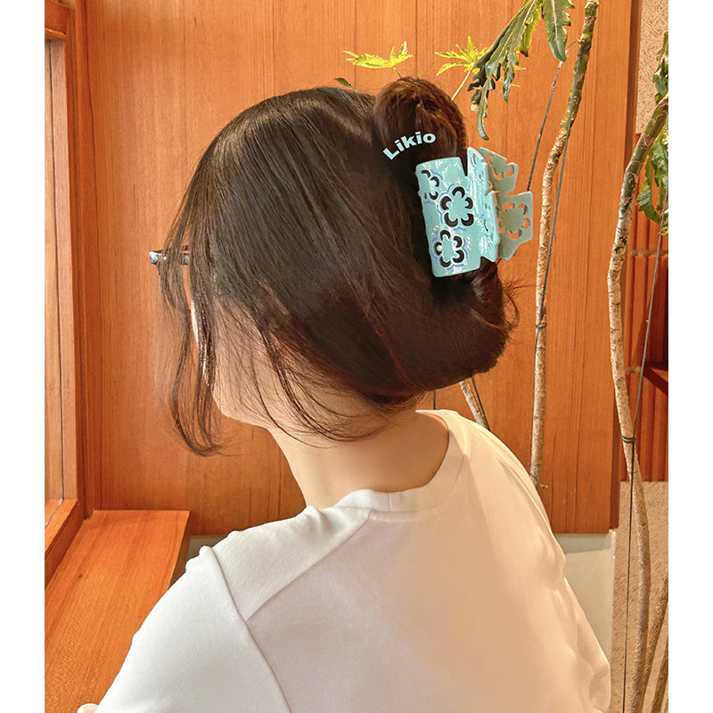 Hollow Plum Blossom Rhinestone Hair Claw