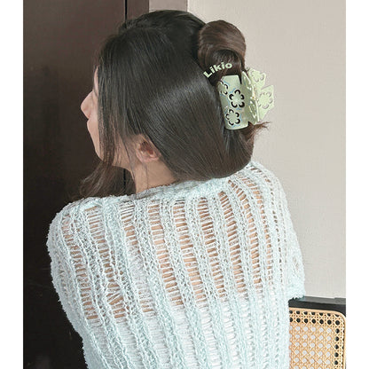 Hollow Plum Blossom Rhinestone Hair Claw